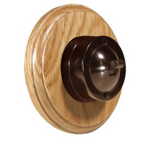 LIN01-1-R-PTM-O-S2W Single Linden Brown Bakelite PUSH TO MAKE Dolly Switch, 1- or 2- Way, 6 Amp, on a Round Light Oak Base